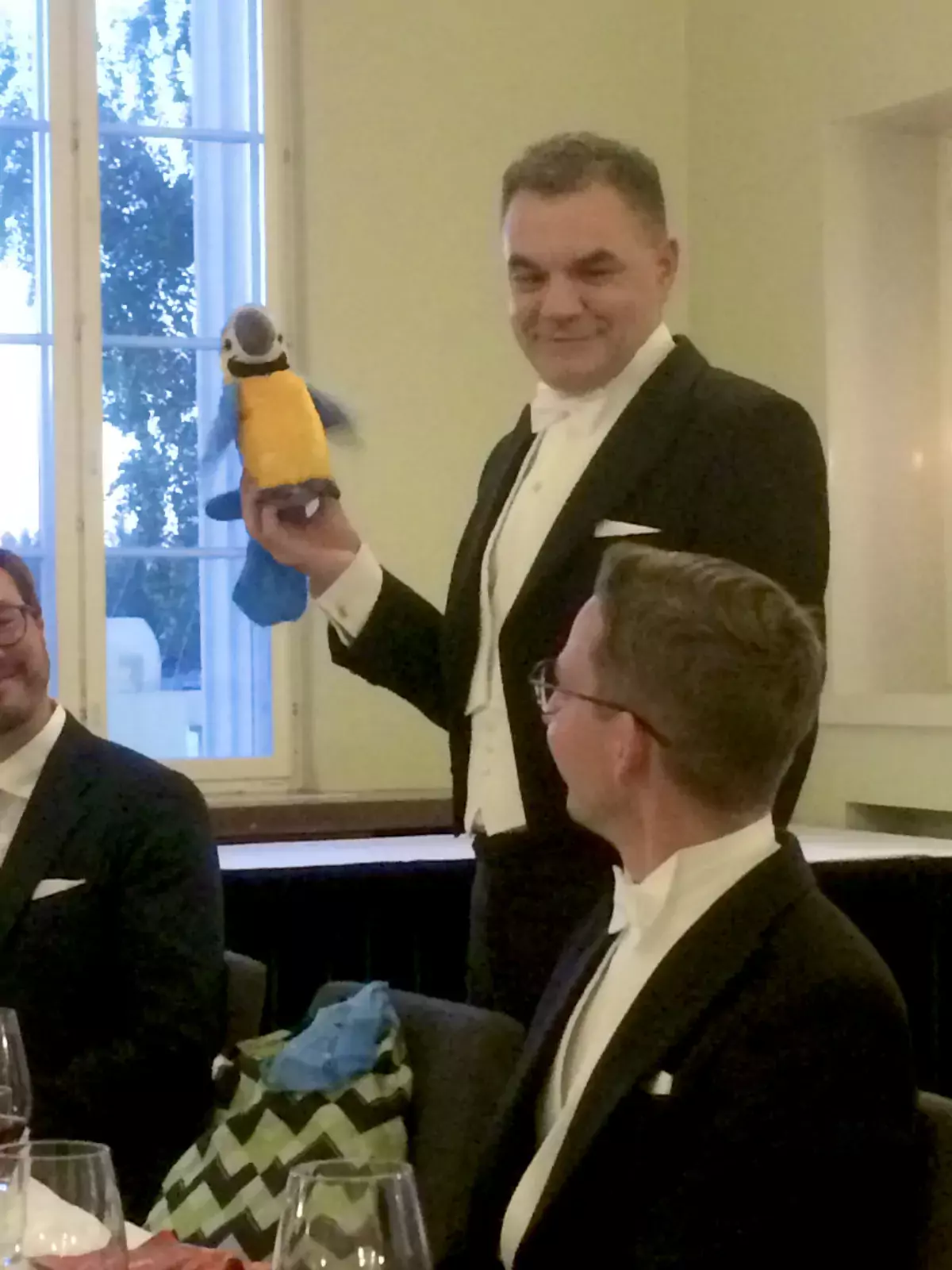 Mr Opponent gifting a parrot to Tommi