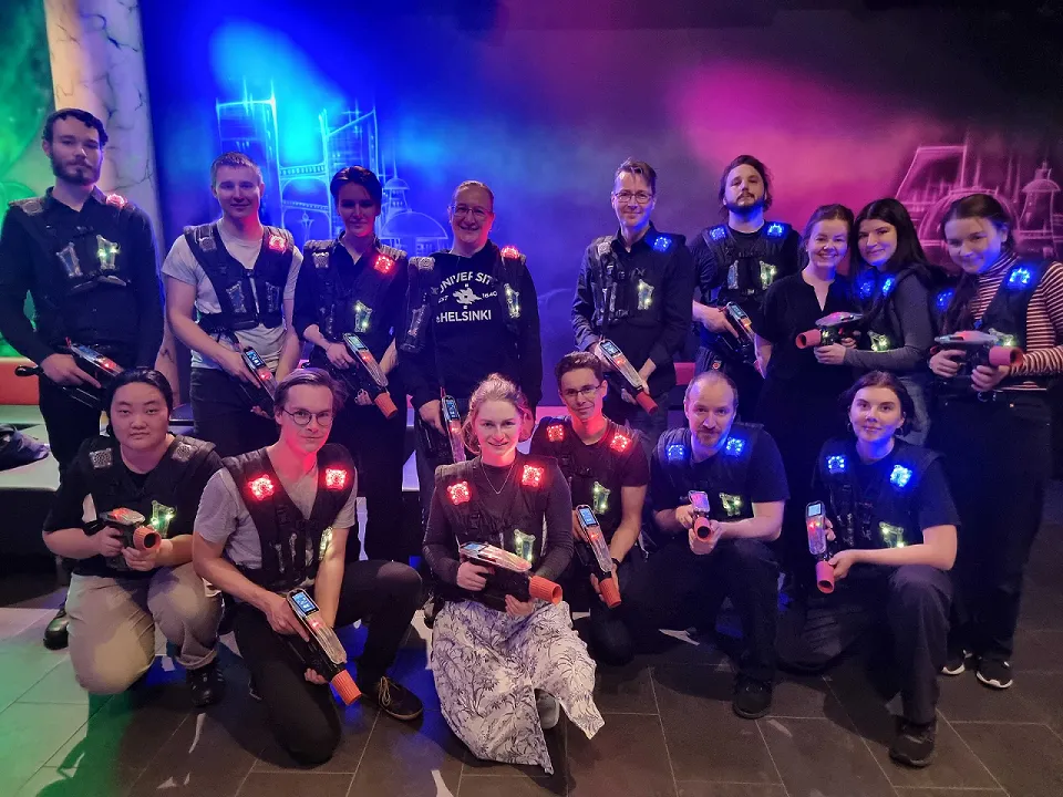 Group of people with laser tag equipment.